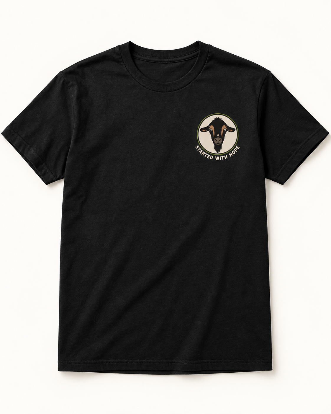 Black Hope Badge Tee with a small goat badge on the chest, sample mockup